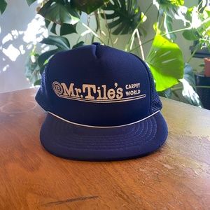 Vintage Mr. Tile’s Carpet World Blue ‘80s Trucker Hat